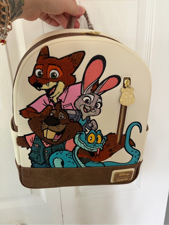 Loungefly Handbags - Loungefly Cream Brown Zootopia Character Backpack